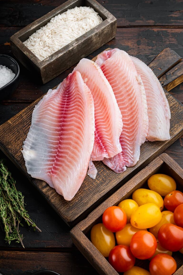 white-fish-fillet-with-basmati-rice-cherry-tomatoes-ingredients-old-wooden-table-top-view